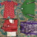 Collection of folded clothing items